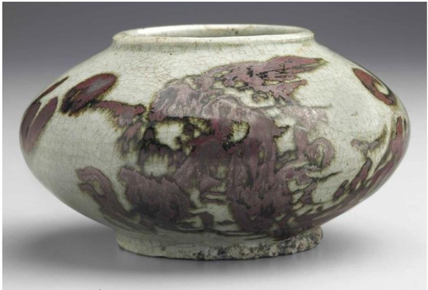 An Iron-decorated Jar with Dragon Design